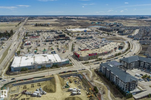 Aerial perspective showcasing commercial developments, residential buildings, and ongoing construction - 731 57 Street Sw, Edmonton, AB - Outdoor With View