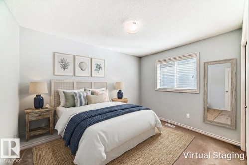 Bedroom featuring light gray walls, a single window with blinds, and carpeted flooring - 6723 19 Avenue, Edmonton, AB 