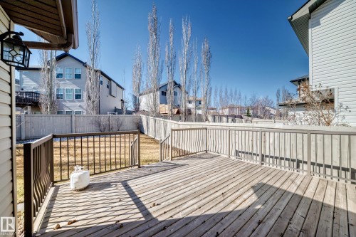 Spacious wood-finish deck with metal railings - 6723 19 Avenue, Edmonton, AB 