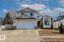 Contemporary two-story residence featuring light-colored siding and a multi-pitch roofline - 86 Westpark Way, Fort Saskatchewan, AB  - Outdoor With Facade 