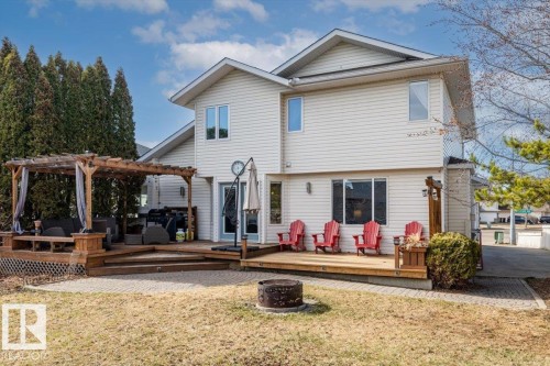 Multi-level wood deck featuring a pergola structure - 86 Westpark Way, Fort Saskatchewan, AB - Outdoor With Deck Patio Veranda