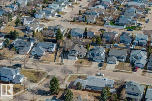 Residential neighborhood featuring a grid street pattern, single-family homes, mature trees, and paved roads - 86 Westpark Way, Fort Saskatchewan, AB - Outdoor With View