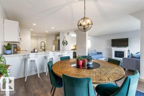 22 Deacon Place, St. Albert, AB - Indoor Photo Showing Dining Room With Fireplace
