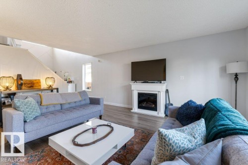 22 Deacon Place, St. Albert, AB - Indoor Photo Showing Living Room With Fireplace