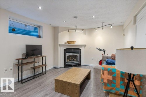 22 Deacon Place, St. Albert, AB - Indoor Photo Showing Living Room With Fireplace
