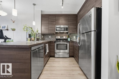 108 2588 Anderson Way, Edmonton, AB - Indoor Photo Showing Kitchen With Stainless Steel Kitchen With Upgraded Kitchen