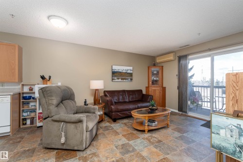 221 16303 95 Street, Edmonton, AB - Indoor Photo Showing Living Room