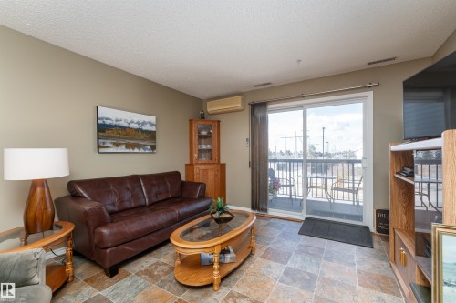 221 16303 95 Street, Edmonton, AB - Indoor Photo Showing Living Room