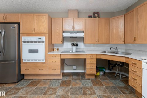 221 16303 95 Street, Edmonton, AB - Indoor Photo Showing Kitchen With Double Sink