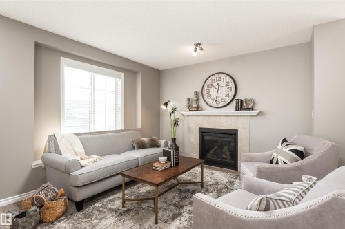 69 20 Augustine Crescent, Sherwood Park, AB - Indoor Photo Showing Living Room With Fireplace