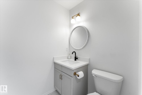 Contemporary vanity with a white countertop and integrated sink - 326 Silver Berry Road, Edmonton, AB - Indoor Photo Showing Bathroom