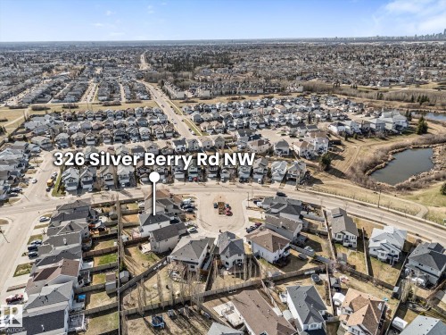 Aerial perspective of a residential neighborhood featuring detached homes and paved roadways - 326 Silver Berry Road, Edmonton, AB - Outdoor With View
