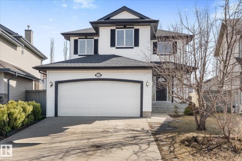 Two-story residence featuring white siding and dark trim accents - 326 Silver Berry Road, Edmonton, AB - Outdoor