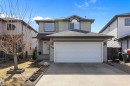 Two-story residence featuring light gray siding and a dark shingle roof - 992 Regency Drive, Sherwood Park, AB  - Outdoor 
