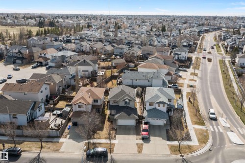 Residential neighborhood featuring a main thoroughfare, pedestrian crossings, and street trees - 992 Regency Drive, Sherwood Park, AB - Outdoor With View
