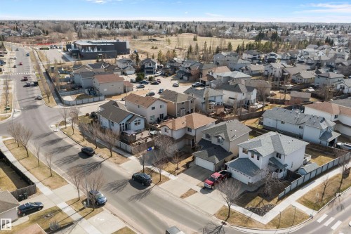 Suburban neighborhood featuring residential streets, detached homes, and green spaces - 992 Regency Drive, Sherwood Park, AB - Outdoor With View