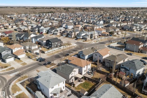 Aerial view showcasing a residential neighborhood with varied architectural styles and individual fenced backyards - 992 Regency Drive, Sherwood Park, AB - Outdoor With View