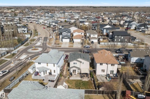 Residential area featuring detached homes with varied architectural styles and roof colors - 992 Regency Drive, Sherwood Park, AB - Outdoor With View