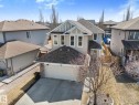 Two-story residence featuring light-toned siding and dark shingle roofing - 41 Heron Crescent, Spruce Grove, AB  - Outdoor 