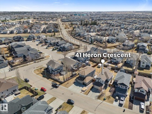 Aerial perspective of a developed residential neighborhood with a variety of detached homes - 41 Heron Crescent, Spruce Grove, AB - Outdoor With View