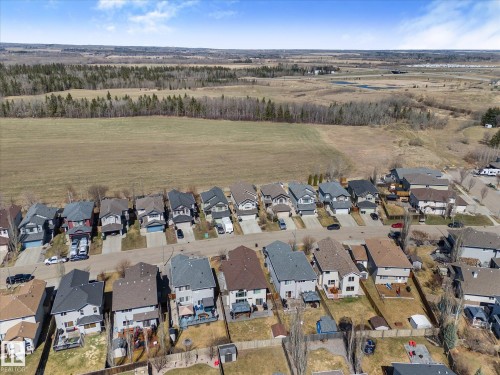 Residential community featuring single-family homes with individual garages - 41 Heron Crescent, Spruce Grove, AB - Outdoor With View
