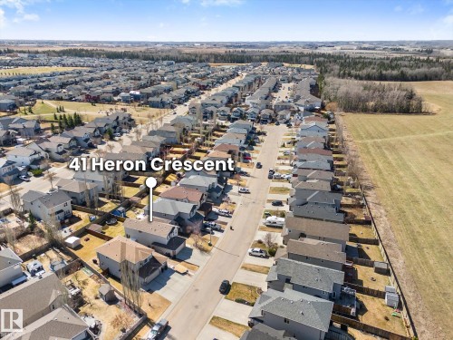 Aerial perspective showcasing a residential neighborhood with individual properties - 41 Heron Crescent, Spruce Grove, AB - Outdoor With View