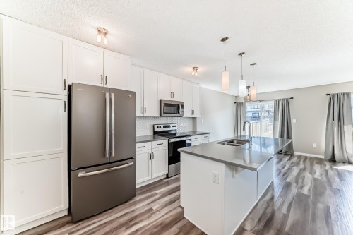 5227 Crabapple Link, Edmonton, AB - Indoor Photo Showing Kitchen With Stainless Steel Kitchen With Double Sink With Upgraded Kitchen