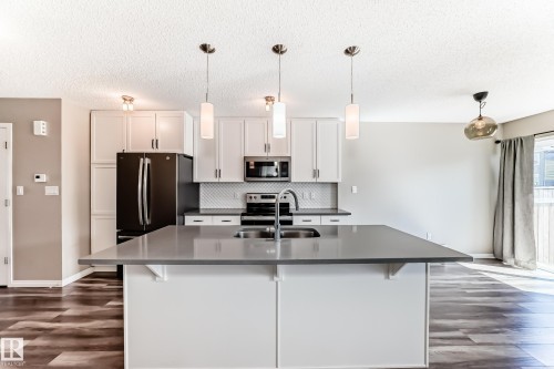 5227 Crabapple Link, Edmonton, AB - Indoor Photo Showing Kitchen With Stainless Steel Kitchen With Double Sink With Upgraded Kitchen