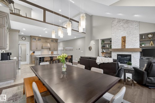 9245 87 Street, Edmonton, AB - Indoor Photo Showing Dining Room With Fireplace