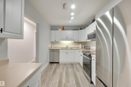 304 6220 Fulton Road, Edmonton, AB - Indoor Photo Showing Kitchen With Double Sink
