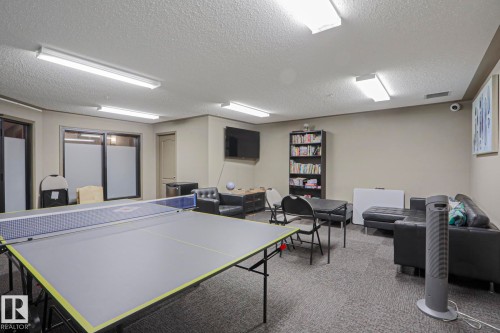 Recreational space featuring carpet flooring and recessed lighting - 201 1520 Hammond Gate Gate, Edmonton, AB - Indoor