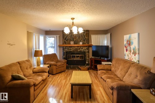 400 60501 Range Road 120, Rural St. Paul County, AB - Indoor Photo Showing Living Room With Fireplace