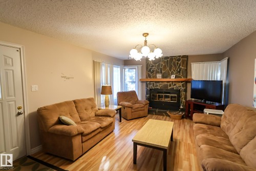 400 60501 Range Road 120, Rural St. Paul County, AB - Indoor Photo Showing Living Room With Fireplace