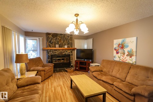 400 60501 Range Road 120, Rural St. Paul County, AB - Indoor Photo Showing Living Room With Fireplace