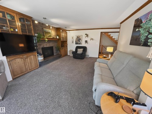 3 Westminster Close, Spruce Grove, AB - Indoor Photo Showing Living Room With Fireplace