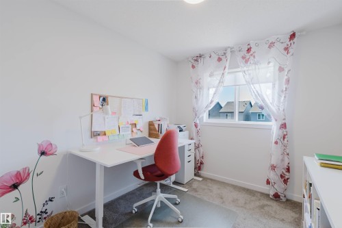 Carpeted room featuring a white-framed window, white walls, and a recessed ceiling light - 5237 Edgemont Boulevard, Edmonton, AB - Indoor Photo Showing Office