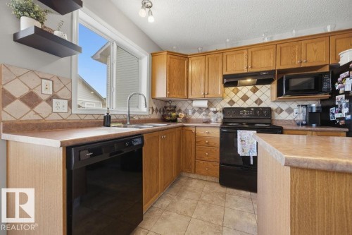4618 Turner Square Square, Edmonton, AB - Indoor Photo Showing Kitchen With Double Sink