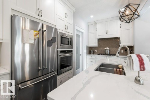 72 Enchanted Way N, St. Albert, AB - Indoor Photo Showing Kitchen With Double Sink With Upgraded Kitchen