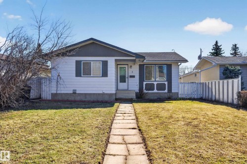 Single-story residence featuring white siding and a contrasting dark gray roof - 5 Linden St, Spruce Grove, AB - Outdoor