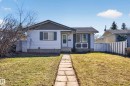 Single-story residence featuring white siding and a contrasting dark gray roof - 5 Linden St, Spruce Grove, AB  - Outdoor 