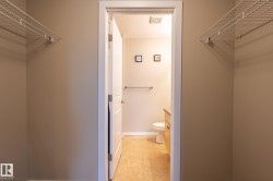 Walk-in closet with dual wire shelving units - 