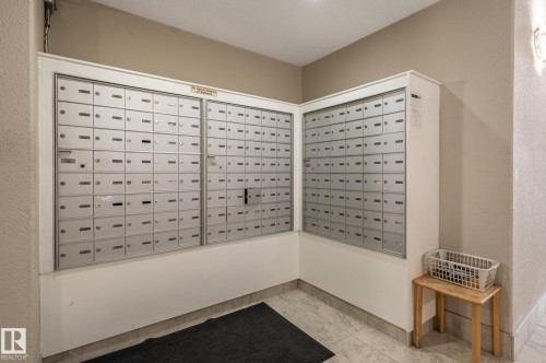 Mailbox area featuring multiple secure, individual units - #314 240 Spruce Ridge Rd, Spruce Grove, AB - Indoor Photo Showing Other Room