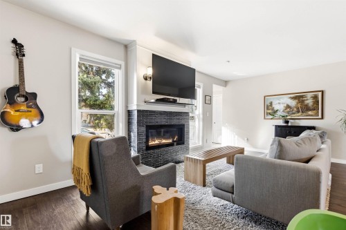 10916 60 Avenue, Edmonton, AB - Indoor Photo Showing Living Room With Fireplace
