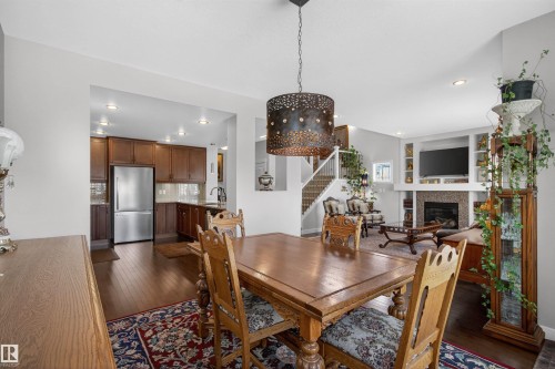 22030 95A Avenue, Edmonton, AB - Indoor Photo Showing Dining Room With Fireplace