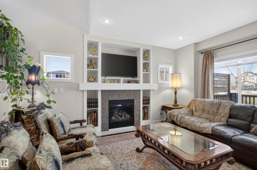 22030 95A Avenue, Edmonton, AB - Indoor Photo Showing Living Room With Fireplace