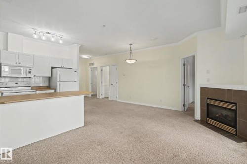 228 8528 82 Avenue, Edmonton, AB - Indoor With Fireplace