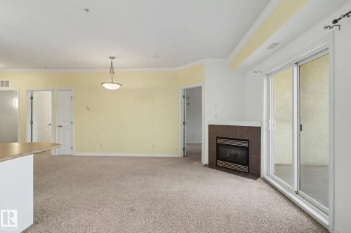 228 8528 82 Avenue, Edmonton, AB - Indoor With Fireplace
