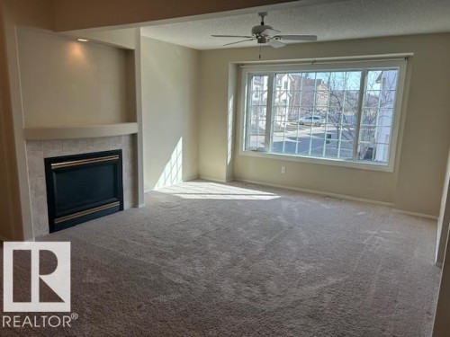 50 9630 176 Street, Edmonton, AB - Indoor Photo Showing Living Room With Fireplace
