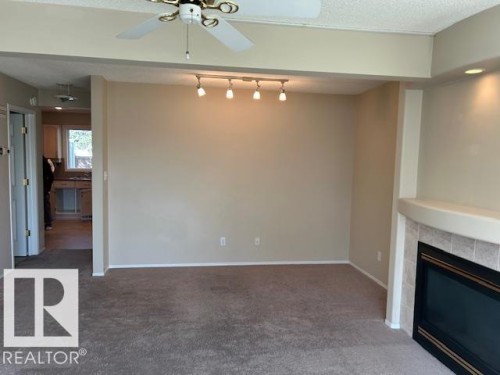 50 9630 176 Street, Edmonton, AB - Indoor Photo Showing Other Room With Fireplace