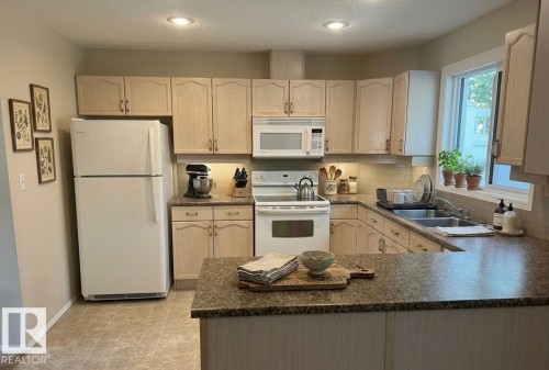 50 9630 176 Street, Edmonton, AB - Indoor Photo Showing Kitchen With Double Sink
